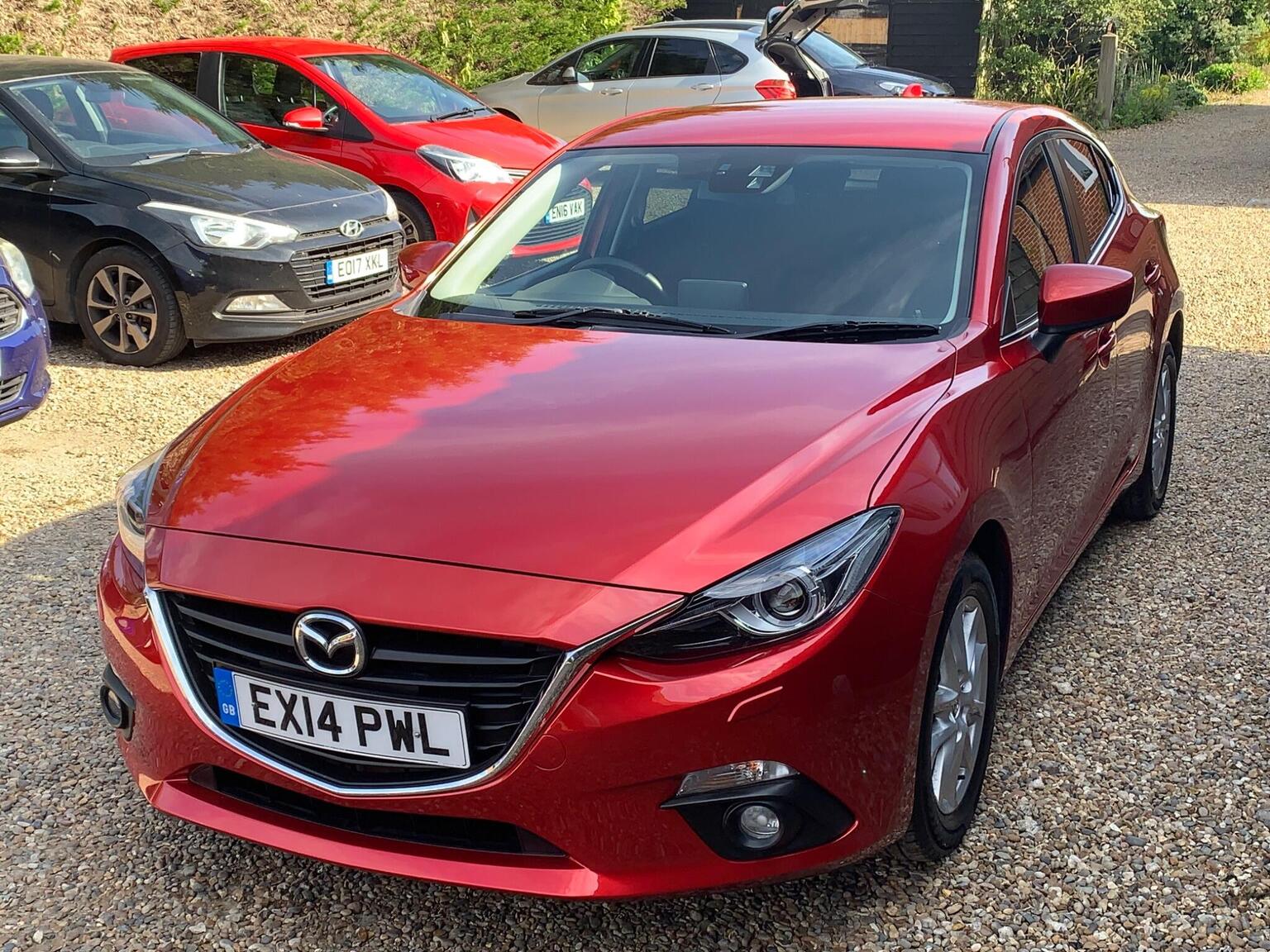 2014 Mazda MAZDA3 2.0 SKYACTIV-G SE-L Nav Euro 5 (s/s) 5dr, exterior view 3