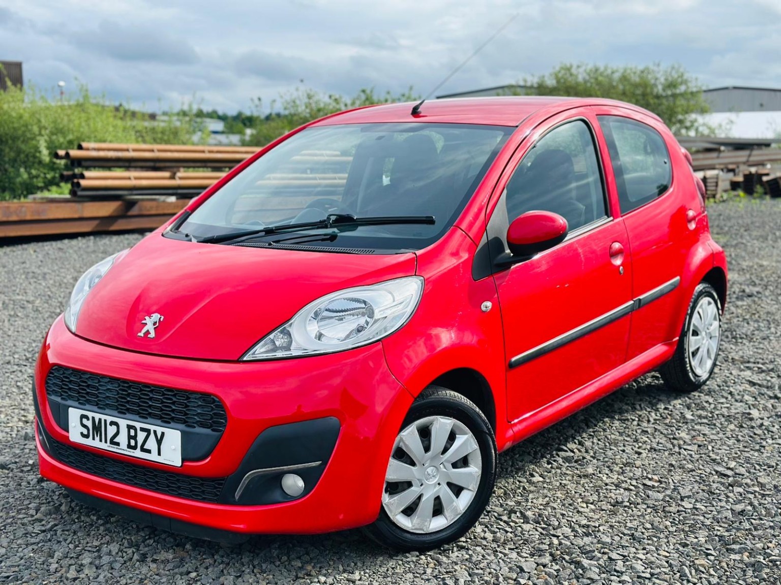 2012 Peugeot 107 1.0 12V Active, exterior view 3