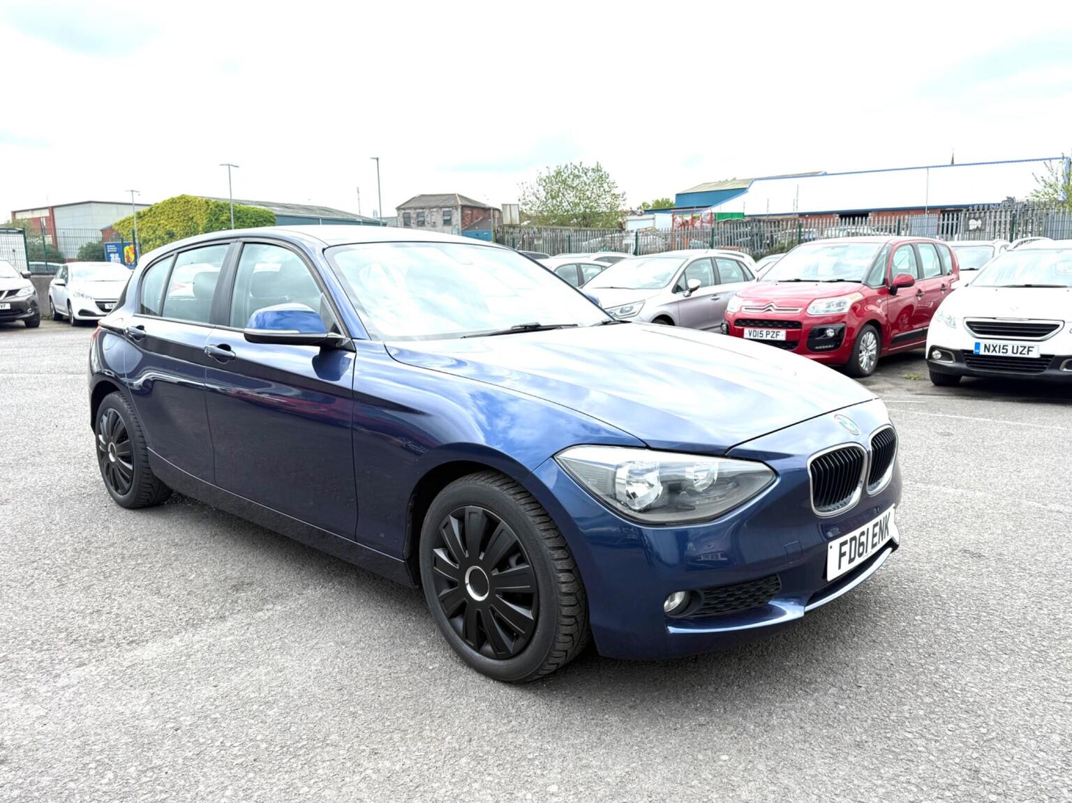 2011 BMW 1 SERIES 1.6 116i SE Euro 5 (s/s) 5dr, exterior view 2