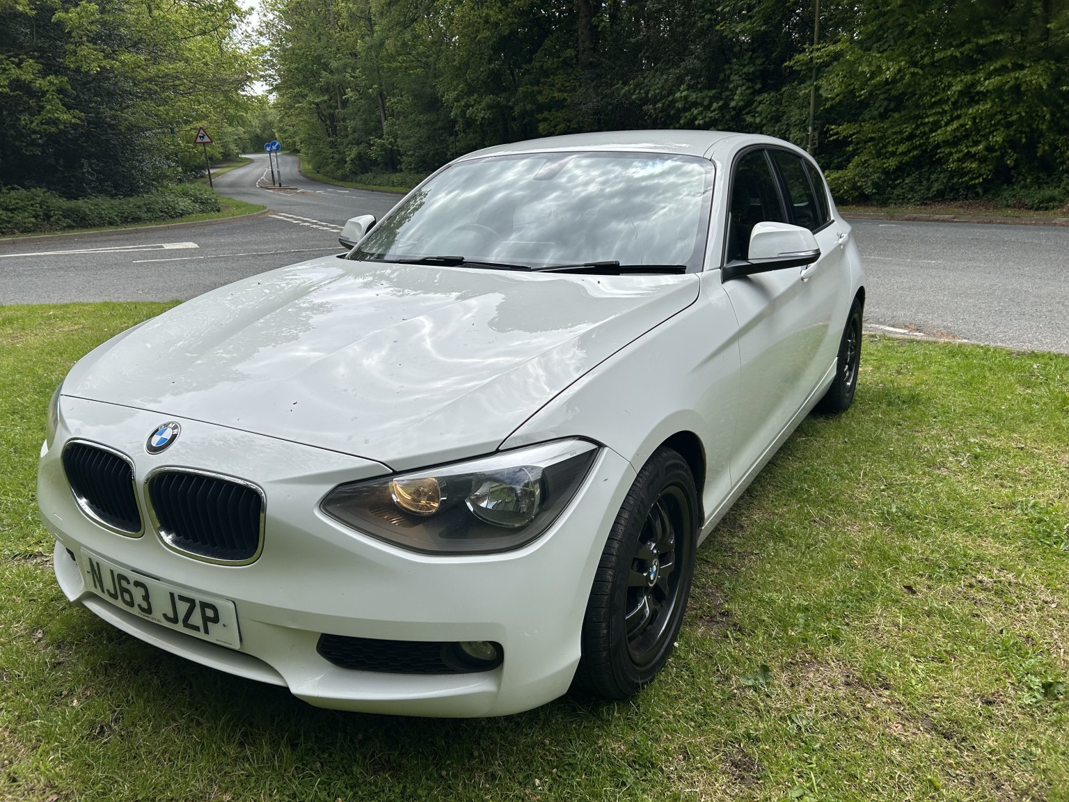 2013 BMW 1 SERIES 1.6 116d EfficientDynamics 5-door, exterior view 4